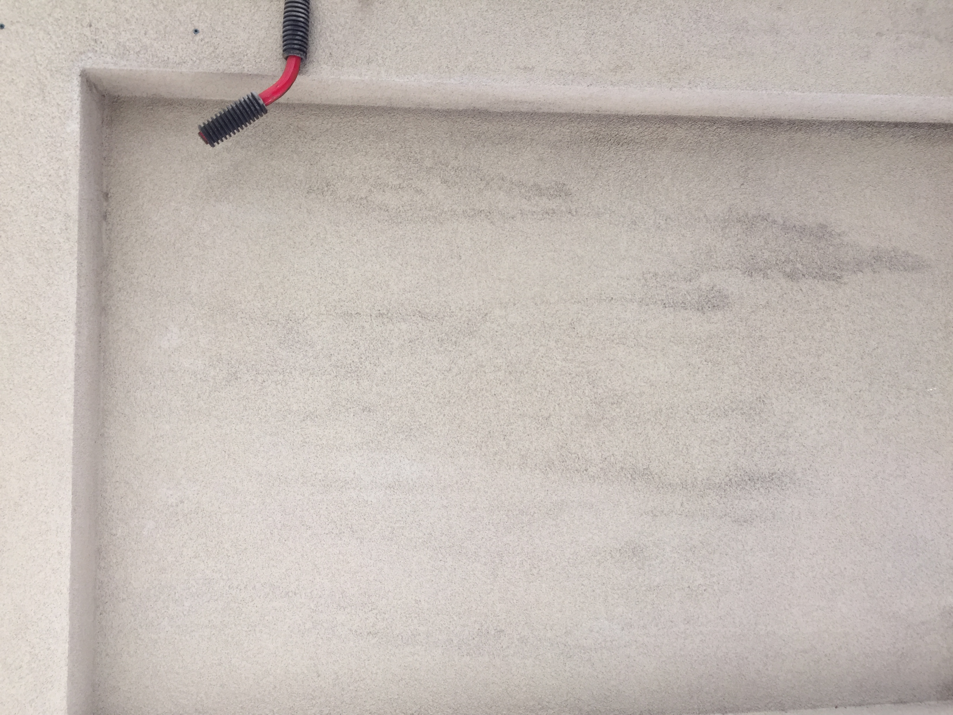 SURE inspection photo showing staining consistent with moisture investigation