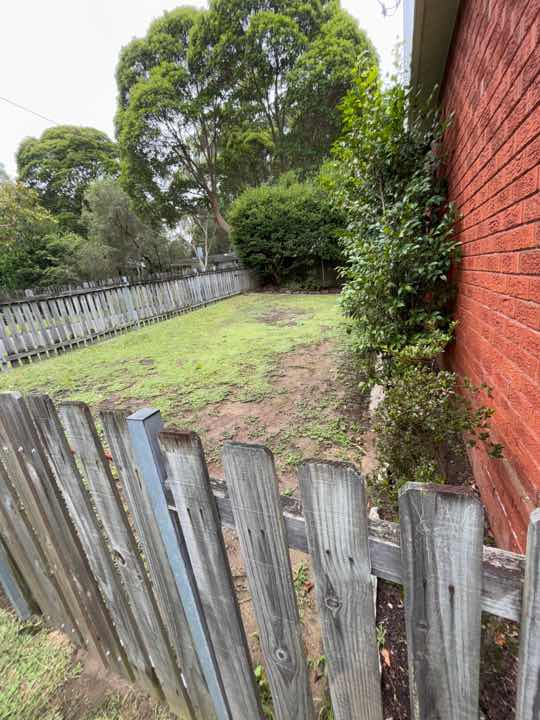 Exposed Timbers and Poor Drainage — real structural defect photographed in a SURE Building Inspections report
