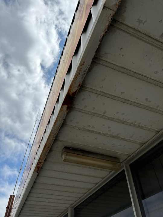 Corrosion to Fascia Frame — real structural defect photographed in a SURE Building Inspections report