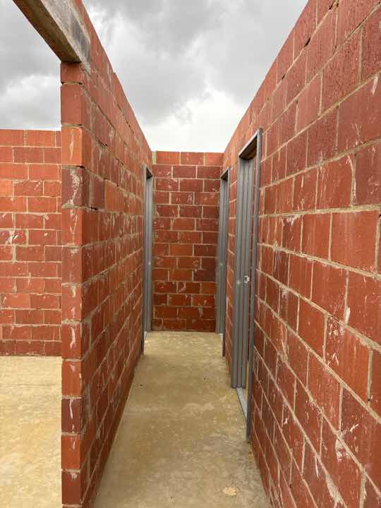 Poorly Finished Mortar Joints on North Wall — real finishes defect photographed in a SURE Building Inspections report