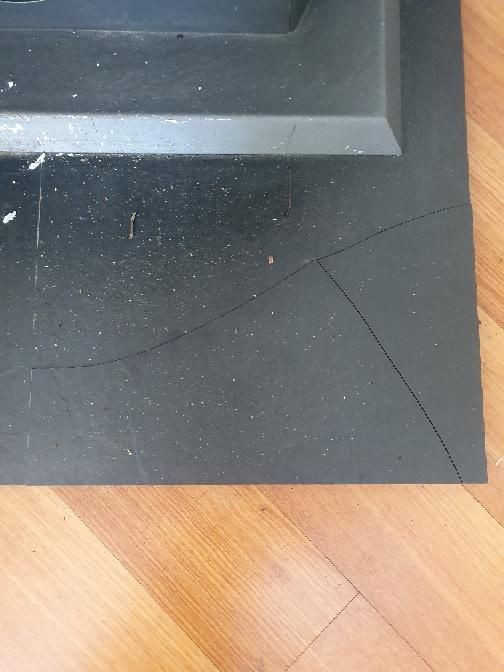 Cracked Floor Tiles in Wet Areas — real finishes defect photographed in a SURE Building Inspections report