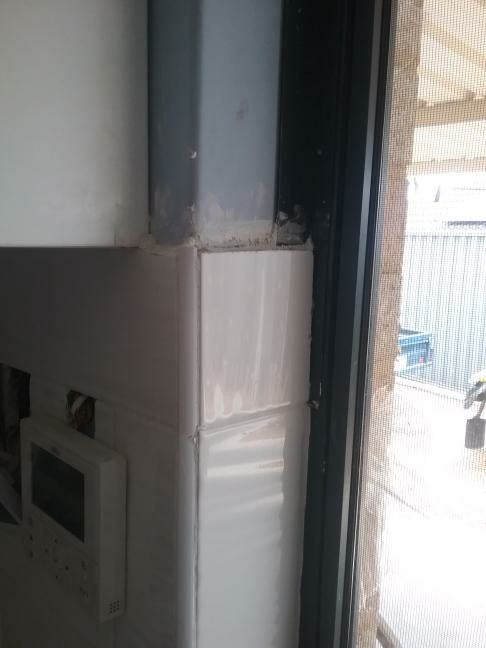 Sink Splashback Sealant Deterioration — real moisture defect photographed in a SURE Building Inspections report