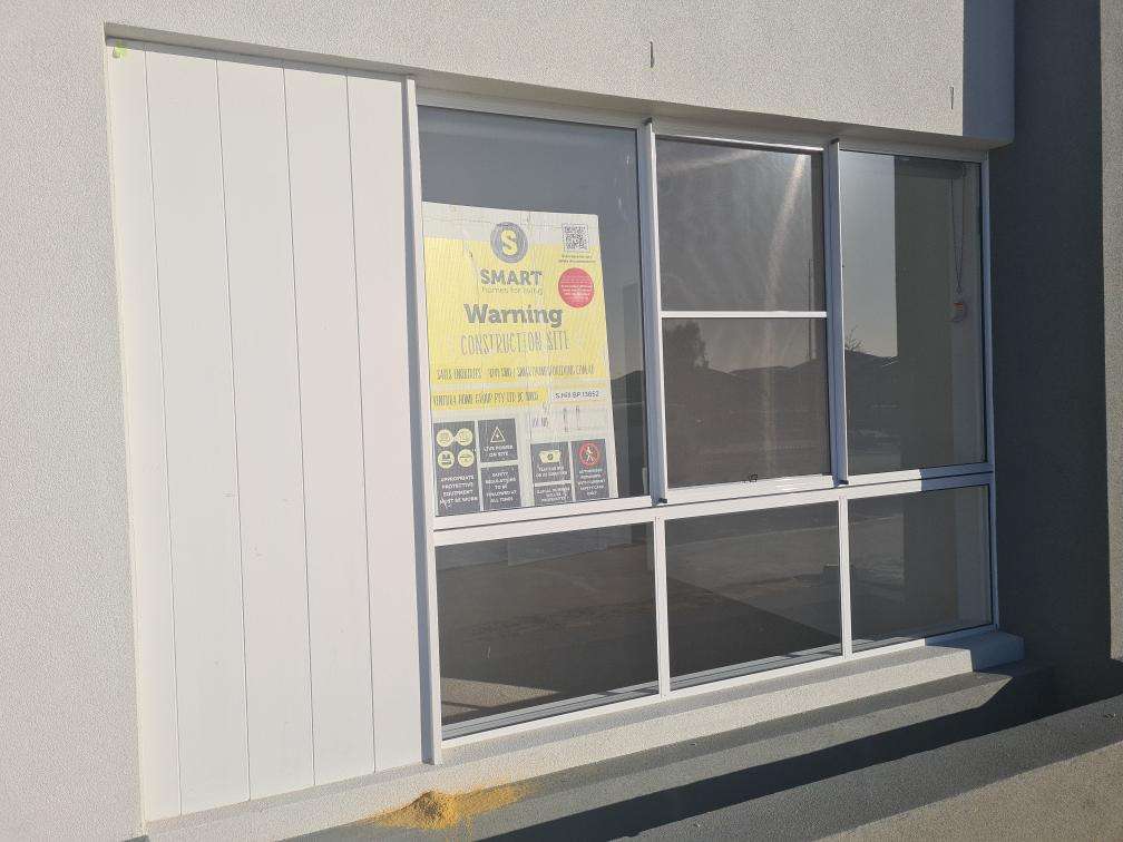 Incomplete Caulking Around Exterior Window Frame — real finishes defect photographed in a SURE Building Inspections report