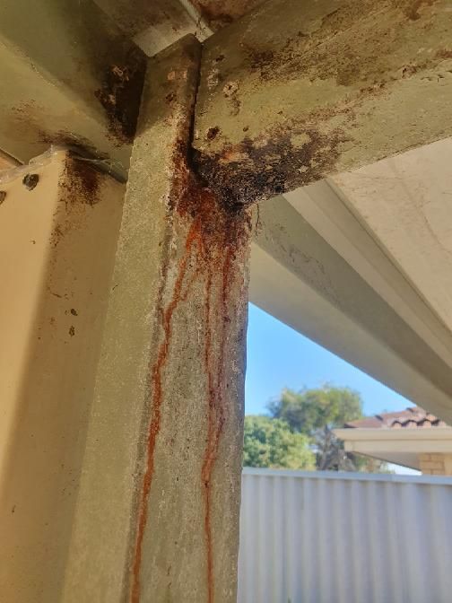 Out Of Plumb Post — real structural defect photographed in a SURE Building Inspections report