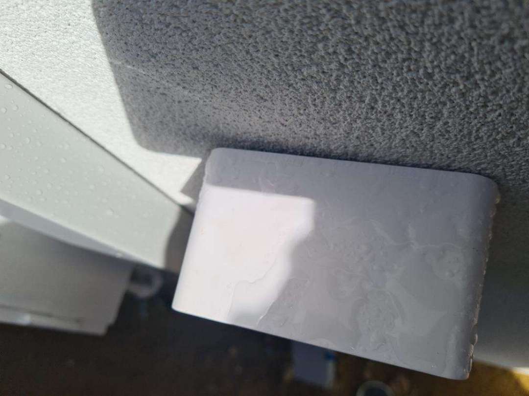 Incomplete Caulking Around Exterior Window Frame — real moisture defect photographed in a SURE Building Inspections report
