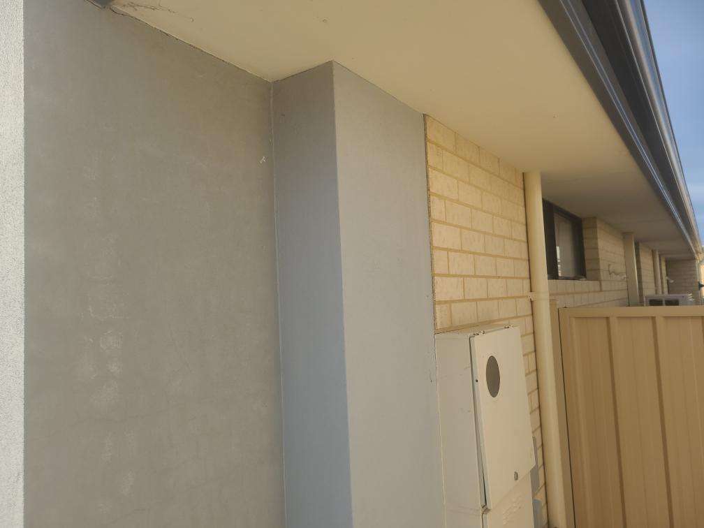 External Wall Cracking due to Settlement — real structural defect photographed in a SURE Building Inspections report