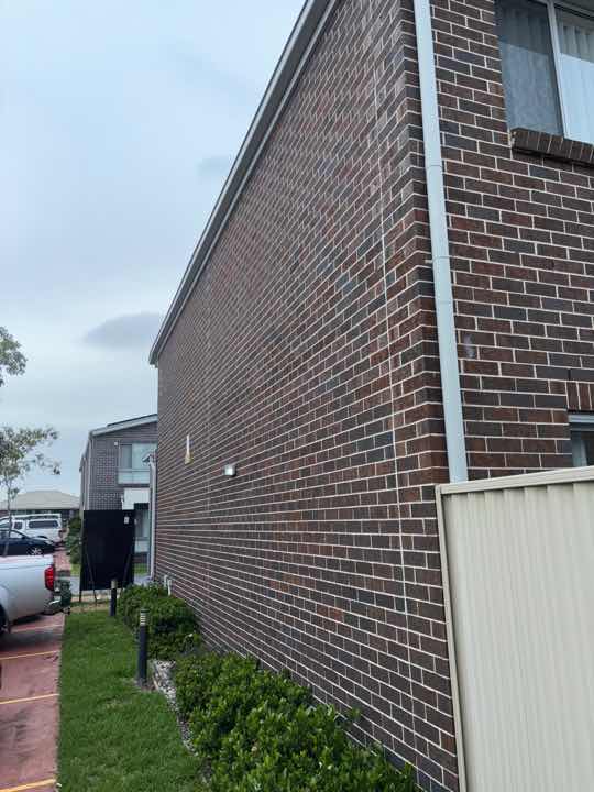 External Wall Cracking due to Settlement — real structural defect photographed in a SURE Building Inspections report