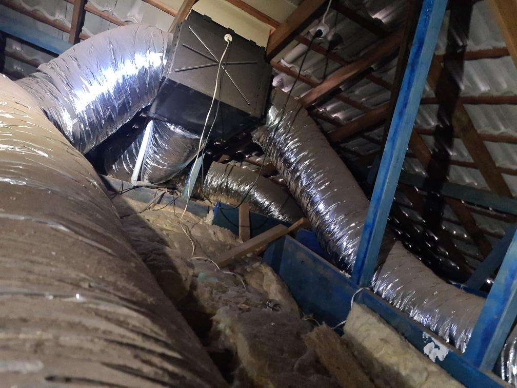 Obstructed Roof Void (Ducting) — real compliance defect photographed in a SURE Building Inspections report