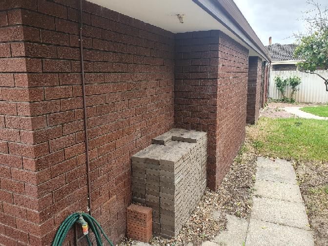 Poor Brickwork Laying or Repair — real finishes defect photographed in a SURE Building Inspections report