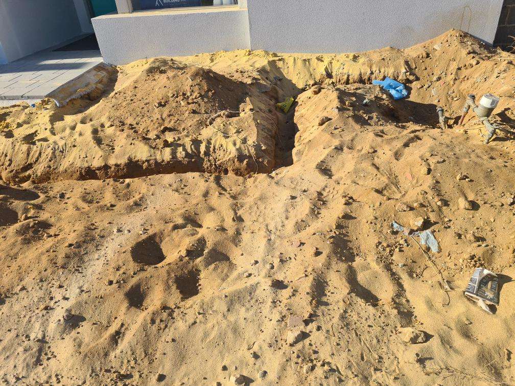 Uncompleted Landscaping — real finishes defect photographed in a SURE Building Inspections report