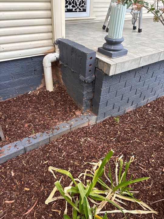 Limited Sub-Floor Ventilation — real moisture defect photographed in a SURE Building Inspections report