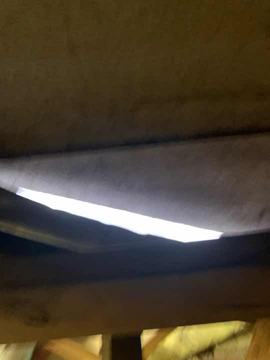 Structural Framing Cut/Altered for Air-Conditioning Unit — real structural defect photographed in a SURE Building Inspections report