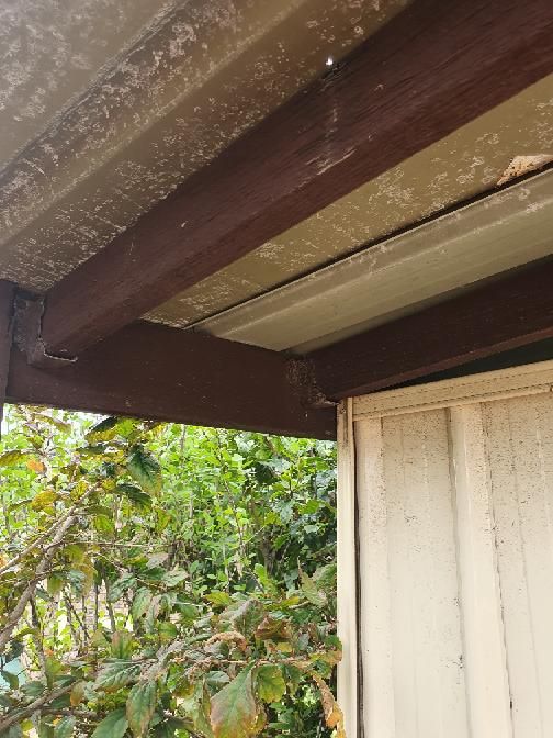 Unstable Decking Posts — real structural defect photographed in a SURE Building Inspections report