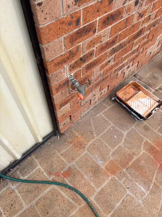 Excessive Moisture Readings — real moisture defect photographed in a SURE Building Inspections report