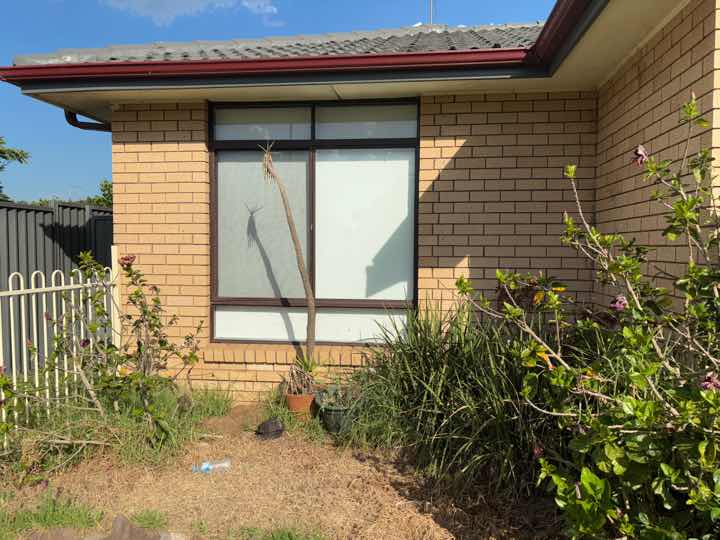 Gaps Around Exterior Window Frames — real finishes defect photographed in a SURE Building Inspections report
