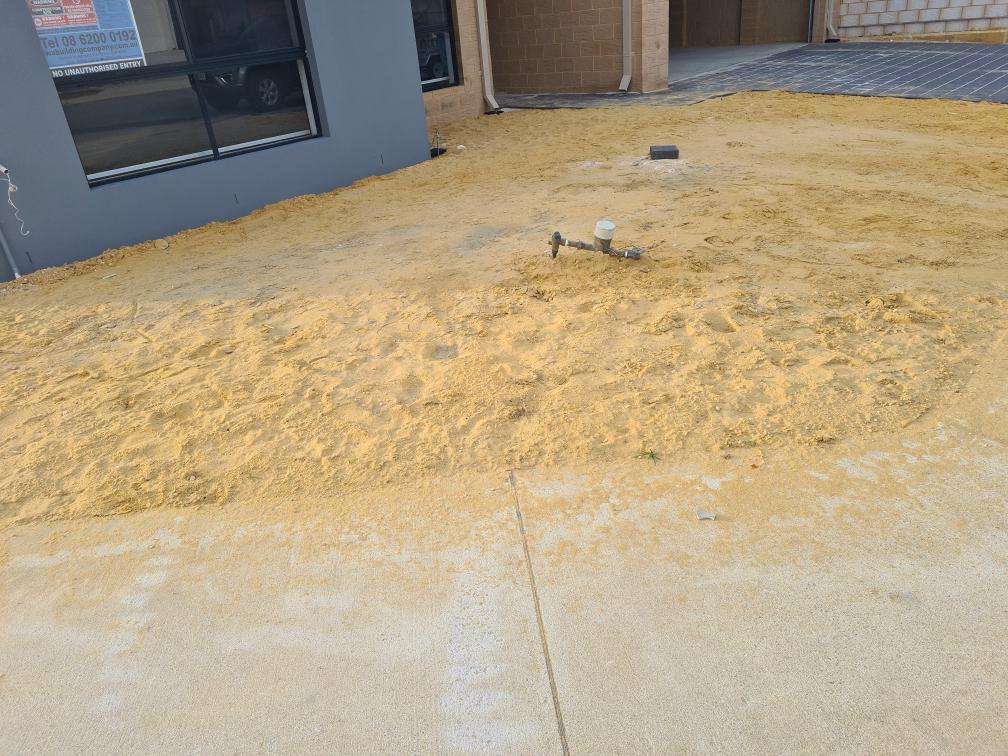 Uncompleted Landscaping — real finishes defect photographed in a SURE Building Inspections report