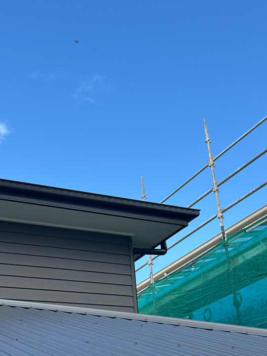 Detached Gutter Clip — real roofing defect photographed in a SURE Building Inspections report