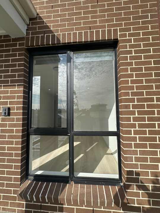 Gaps between Window Frame and Wall Cladding — real moisture defect photographed in a SURE Building Inspections report