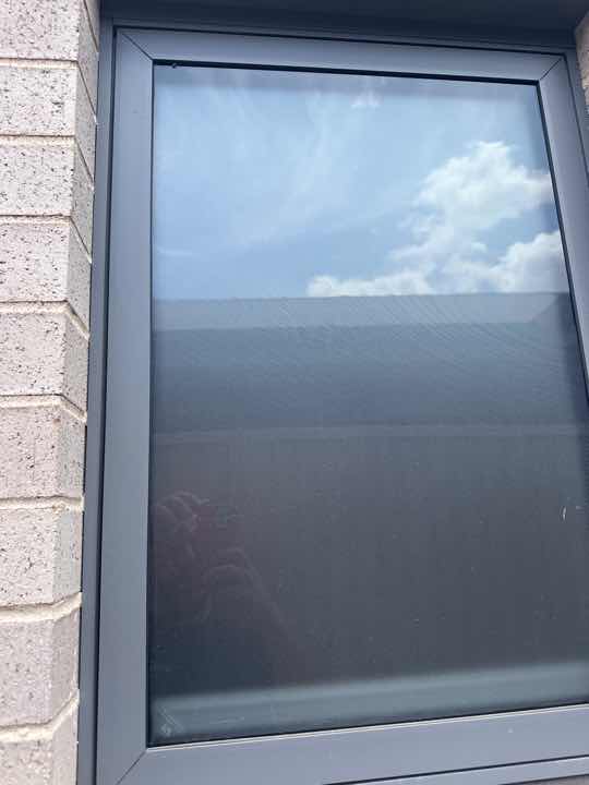 Gaps between Window Frame and Wall Cladding — real moisture defect photographed in a SURE Building Inspections report