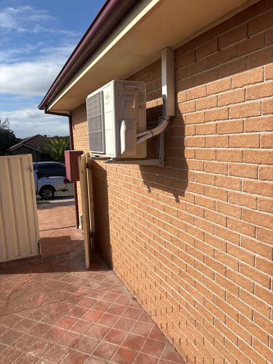 Concealed Slab Edge — real termite defect photographed in a SURE Building Inspections report