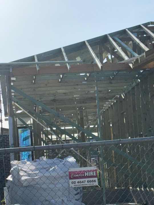 Load Bearing Steels Incomplete — real structural defect photographed in a SURE Building Inspections report