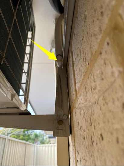 Air Conditioner Overflow Creating Conducive Conditions — real termite defect photographed in a SURE Building Inspections report