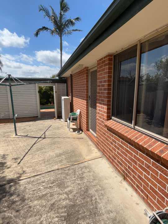 External Wall Cracking due to Settlement — real structural defect photographed in a SURE Building Inspections report