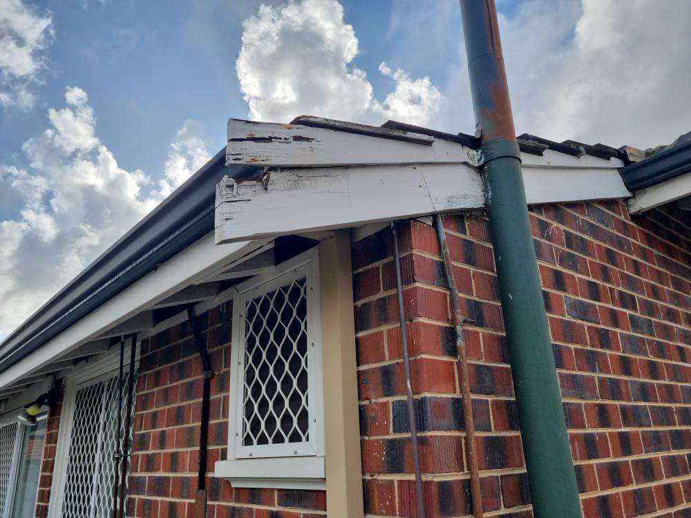 Bowing of Fascia Board — real structural defect photographed in a SURE Building Inspections report