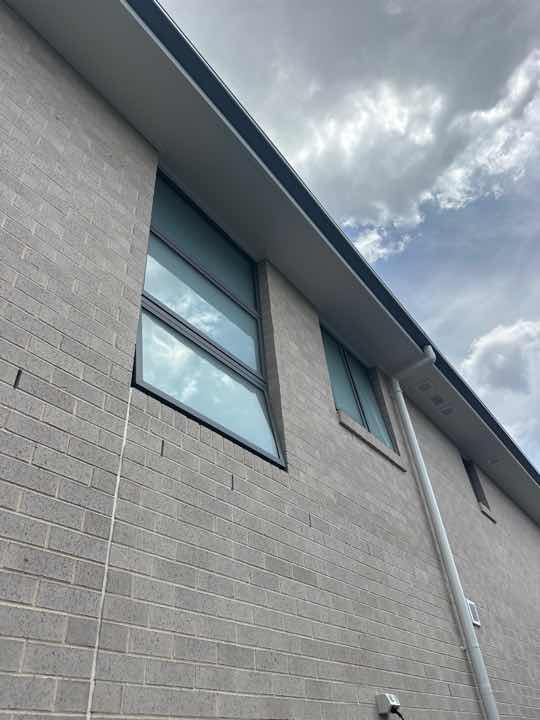 Gaps between Window Frame and Wall Cladding — real moisture defect photographed in a SURE Building Inspections report