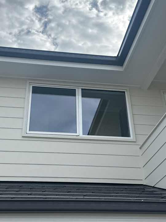 Gaps between Window Frame and Wall Cladding — real moisture defect photographed in a SURE Building Inspections report