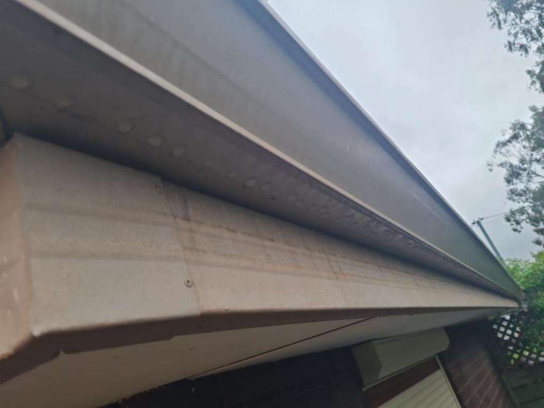 Porch Base and Flooring Cracks and Settlement — real finishes defect photographed in a SURE Building Inspections report