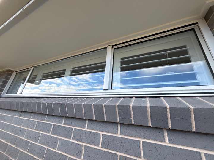 Gaps Around Exterior Window Frames — real finishes defect photographed in a SURE Building Inspections report