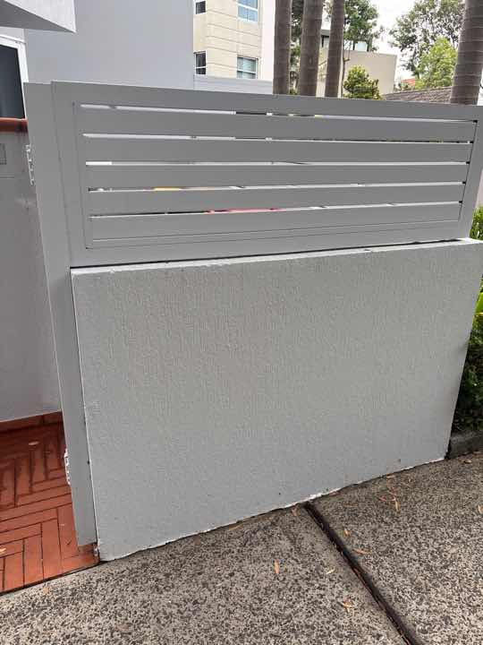 External Wall Cracking due to Settlement — real structural defect photographed in a SURE Building Inspections report