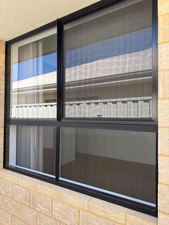 Damaged Exterior Window Frames — real finishes defect photographed in a SURE Building Inspections report