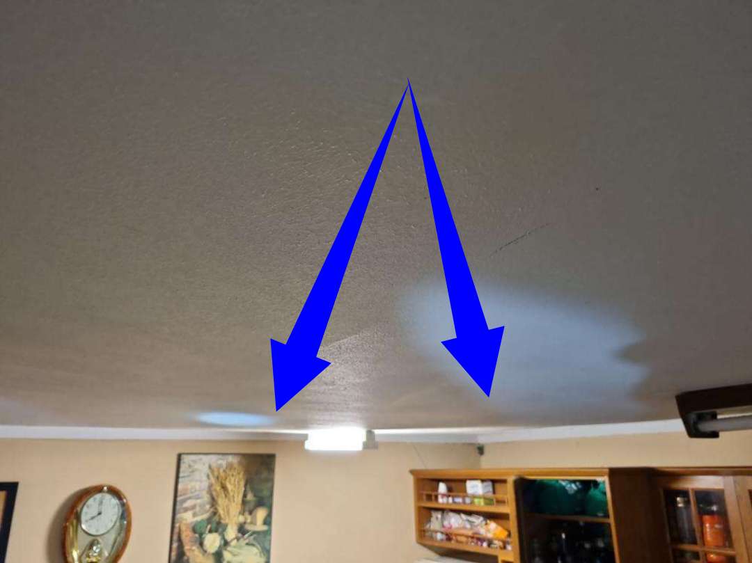 Sagging Or Unevenness In Bedroom 2 Ceiling — real structural defect photographed in a SURE Building Inspections report