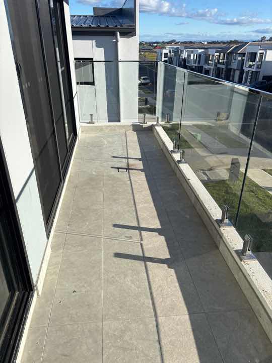 Loose Hand Rail — real structural defect photographed in a SURE Building Inspections report
