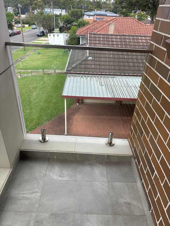 Cosmetic Cracks in Exterior Render — real finishes defect photographed in a SURE Building Inspections report