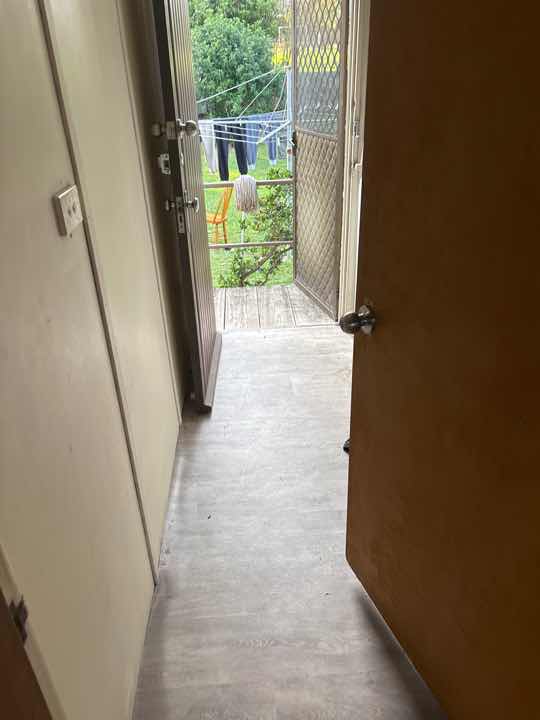 Uneven Sun Room Floor — real structural defect photographed in a SURE Building Inspections report