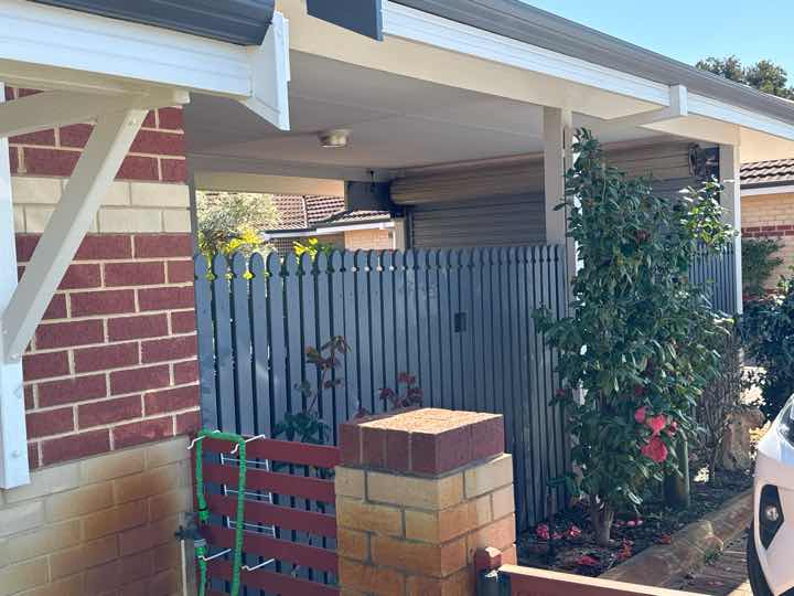 Mulch and Garden Beds Against Building Termite Conducive — real termite defect photographed in a SURE Building Inspections report