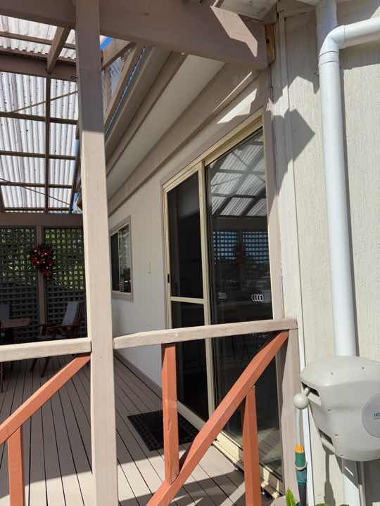 Gaps between Window Frame and Wall Cladding — real structural defect photographed in a SURE Building Inspections report
