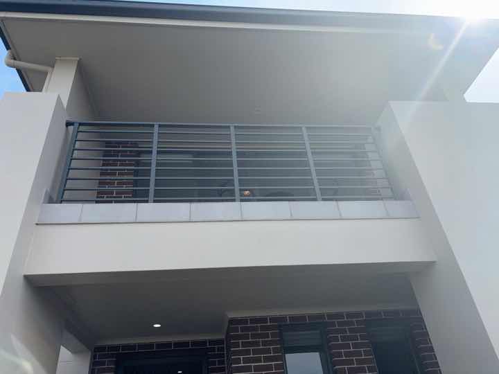 Wall Cracking due to Settlement — real structural defect photographed in a SURE Building Inspections report