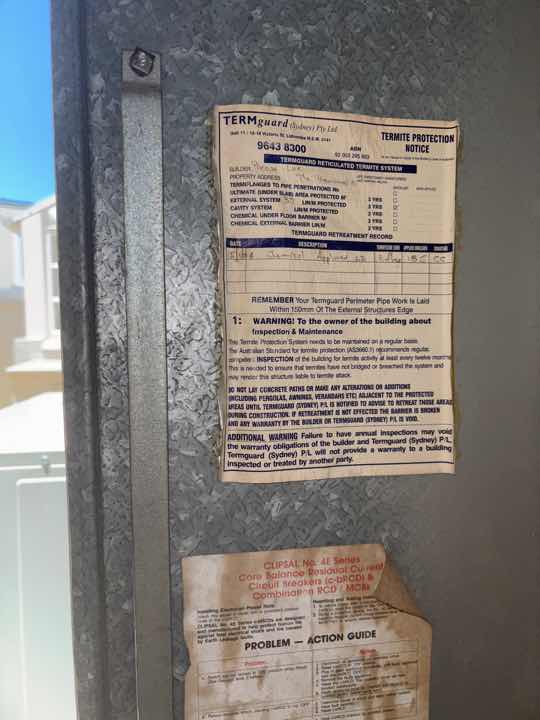 No Visible Evidence of Previous Termite Treatment — real termite defect photographed in a SURE Building Inspections report