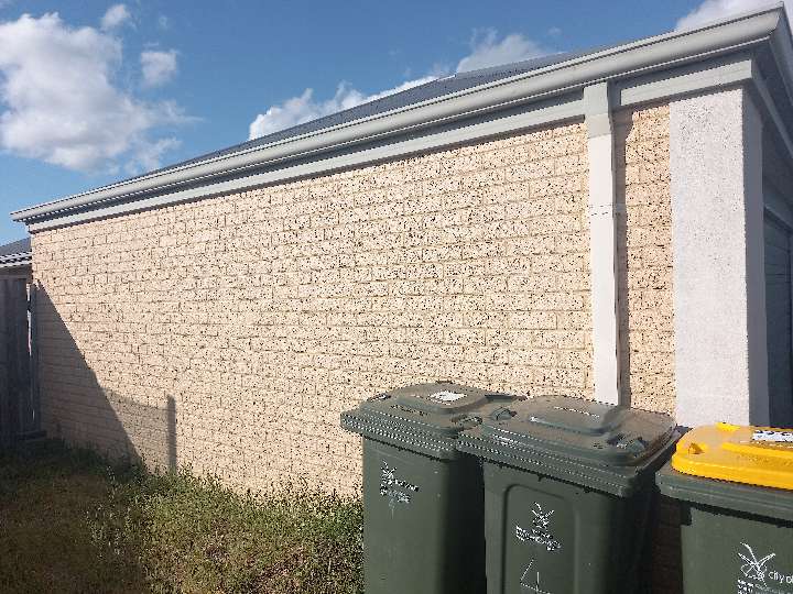Aged Brickwork with Historical Repairs — real finishes defect photographed in a SURE Building Inspections report