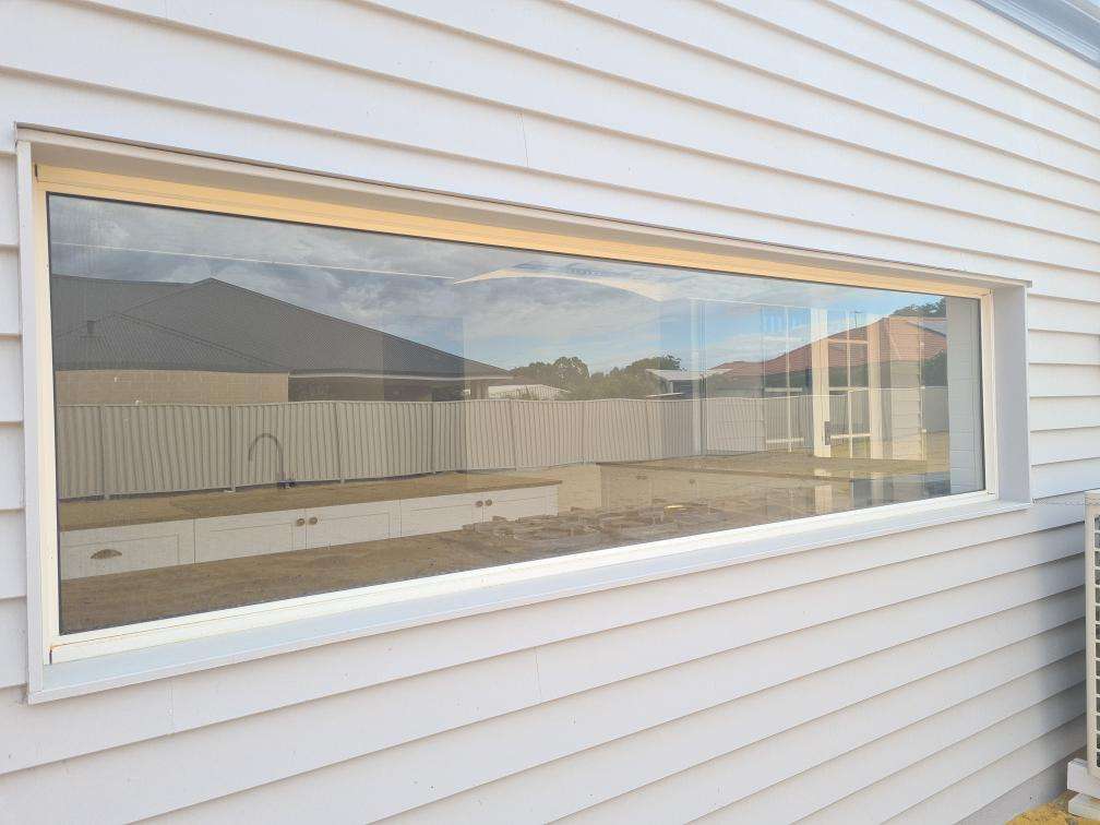 Incomplete Caulking Around Exterior Window Frame — real finishes defect photographed in a SURE Building Inspections report