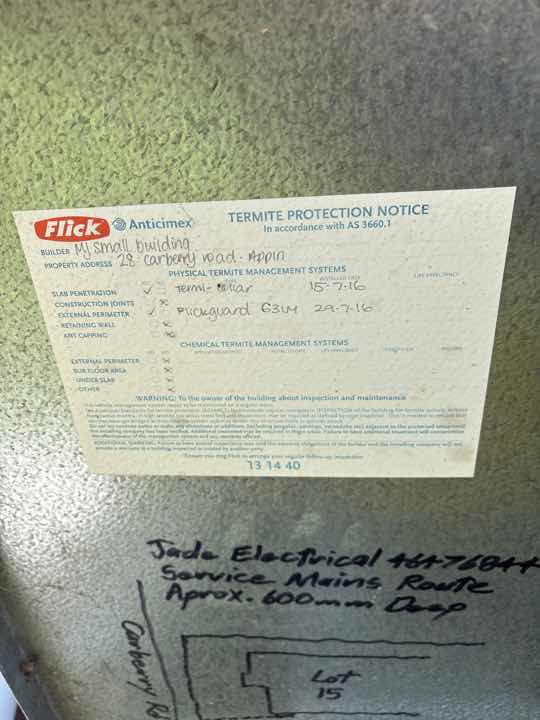 No Visible Evidence of Previous Termite Treatment — real termite defect photographed in a SURE Building Inspections report