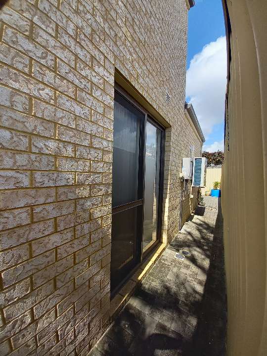 Dirty Exterior Door Frames — real finishes defect photographed in a SURE Building Inspections report