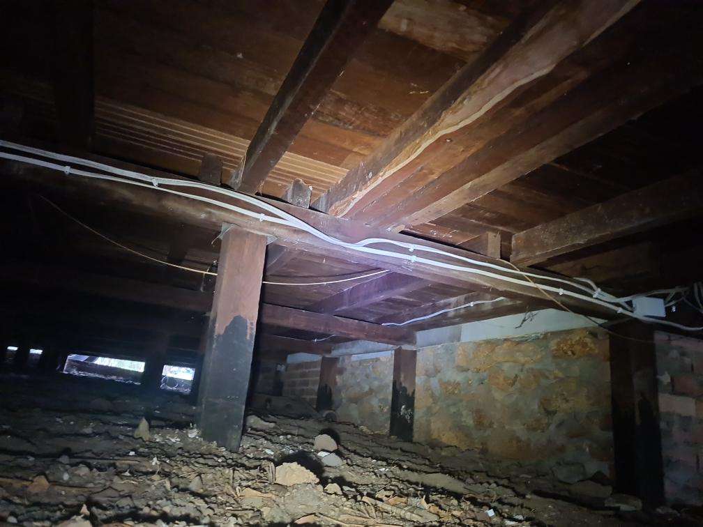 Restricted Sub-floor Access — real compliance defect photographed in a SURE Building Inspections report