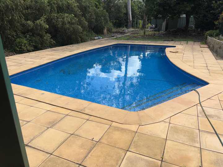 Inadequate Pool Fence — real compliance defect photographed in a SURE Building Inspections report