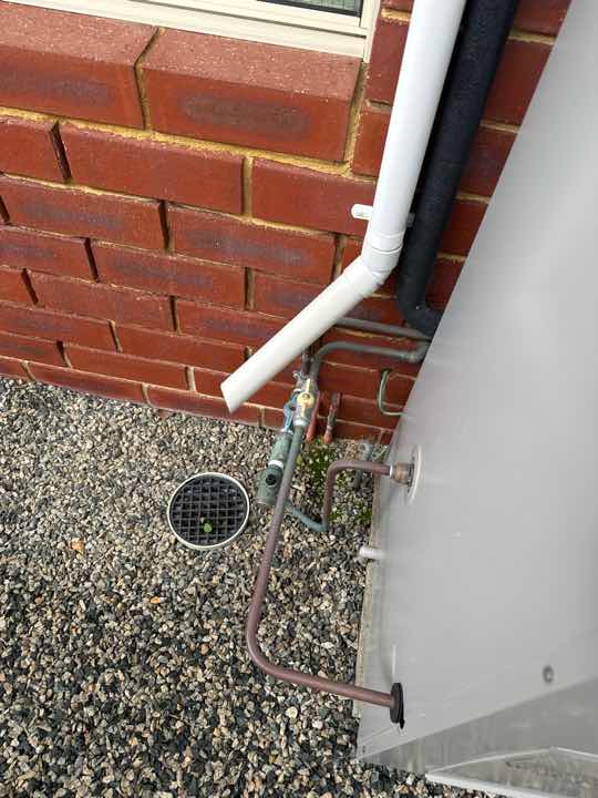Slab Edge Not Adequately Exposed — real termite defect photographed in a SURE Building Inspections report