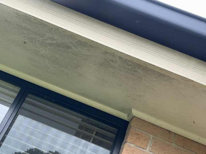 Inadequate Slab Edge Exposure — real soil_foundation defect photographed in a SURE Building Inspections report